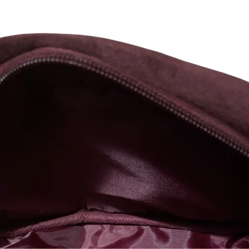 SUEDE QUILTED MINI PEARL EMBOSSED WRISTLET CLUTCH